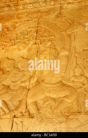 [Churning of the Ocean of Milk], bas relief depicting Hanuman and army of devas pulling on serpents tail, [Angkor Wat], Cambodia Stock Photo