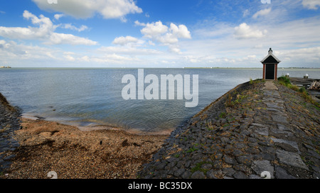 View from the harbor of Volendam a small village in the Netherlands overlooking the lake called IJsselmeer Stock Photo