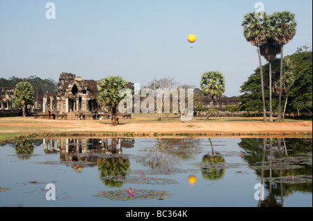 [Angkor Wat] [temple complex], Cambodia, tourist balloon and blue sky reflected in lotus pond, [Southeast Asia] Stock Photo