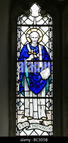 Stained Glass Window by William Aikman, Depictioning Saint John Chrysostom. St Maunanus and St Stephen Church, Mawnan, Cornwall. Installed 1946 Stock Photo