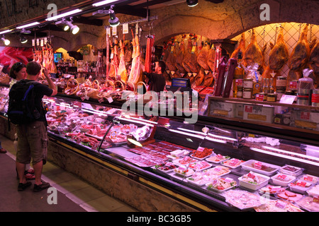 Meat stall La Boqueria market hall Barcelona Catalunya Spain Stock Photo