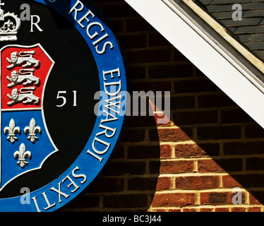 A section of the crest of King Edward VI Grammar School in Chelmsford. Stock Photo