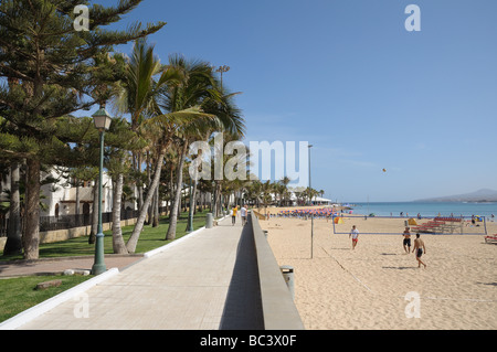 Promenade and Beach in Caleta de Fuste, Fuerteventura Stock Photo