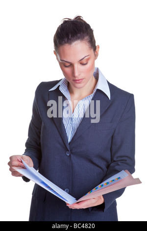 Businesswoman reading some documents in a file isolated on a white background Stock Photo