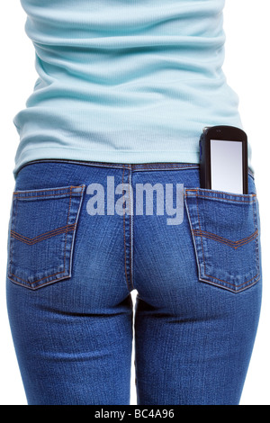A smartphone in the rear pocket of a womans jeans blank screen with clipping path for you to add your own message or design Stock Photo