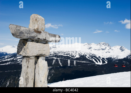 an Inuit Inukshuk stone statue Whistler mountain resort venue of the 2010 Winter Olympic Games Stock Photo