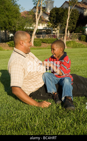 California 2008. African-American Parent Father and son enjoy each other outside. MR  © Myrleen Pearson Stock Photo