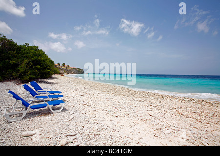 Sunbeds on the beach of the Caribbean isle Curacao in the Netherlands Antilles Stock Photo
