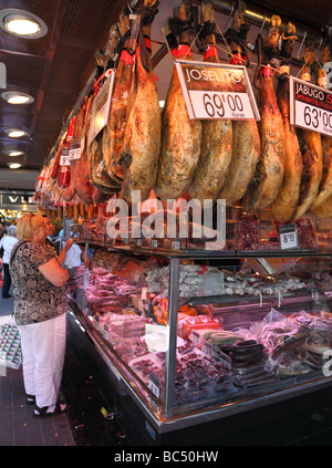 Meat stall La Boqueria market hall Barcelona Catalunya Spain Stock Photo