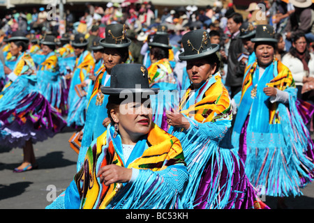 Cholitas dancing the morenada at Gran Poder festival , La Paz , Bolivia Stock Photo