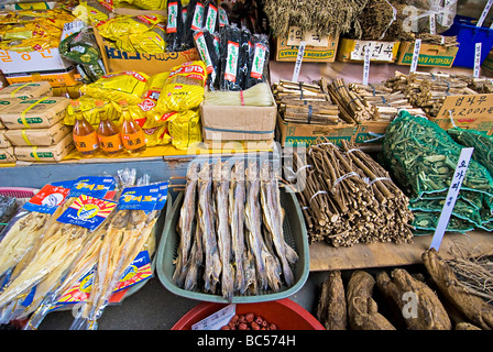 Dried seafood, spices, vegetables, and packaged goods on display at open air marketplace in Wonju, Korea. Stock Photo