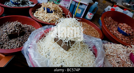 Dried seafood, spices and vegetables on display at open air marketplace in Wonju, Korea Stock Photo