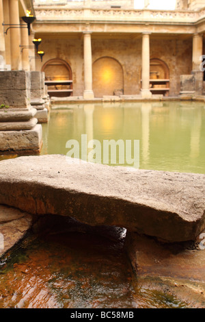The Roman Baths main thermal spa pool in the city of Bath England Stock Photo