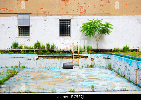 Colorful Photo of an Abandoned, Decrepit and Empty Pool (For Editorial Use Only) Stock Photo