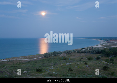 Moonlight path on night sea water surface Stock Photo