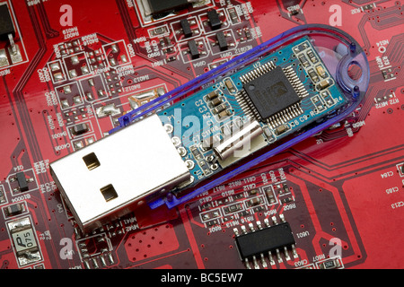 usb pendrive memory stick on circuit board pen drive Stock Photo