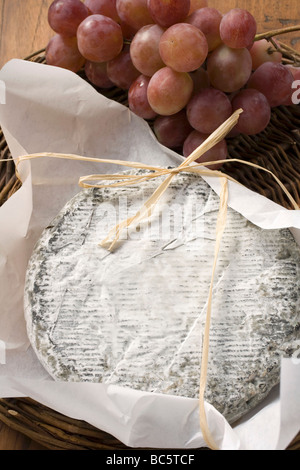 Blue cheese (Bresse Bleu, France) and grapes - Stock Photo