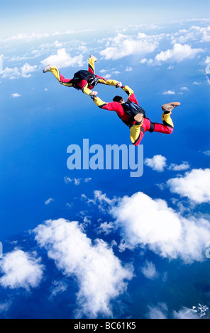 two people doing parachute jumping, full shot Stock Photo