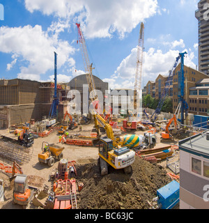 A 2 picture stitch panoramic view of the construction site of the Shard building near London Bridge during the ground works. Stock Photo