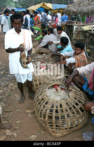 Indian Man Of The Dhuruba Tribe In The Chicken Market, Baipari Guda, Orissa Stock Photo