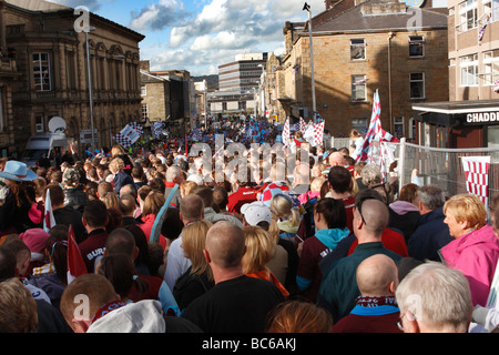 Football fans waiting to see the parade by Burnley F.C in the town centre after their promotion to the Premiership in 2009. Stock Photo