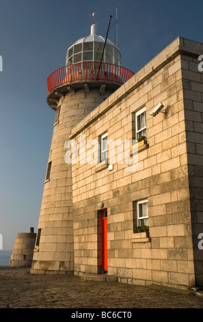 Lighthouse on a pier in Howth, County Dublin, Ireland Stock Photo