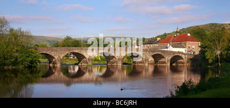 Stone arched bridge over River Wye at Builth Wells, a popular spa town in Mid-Wales Stock Photo