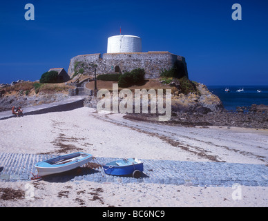 Fort Grey an old Martello Tower on the west coast, which now houses a local history museum at Rocquaine Bay Stock Photo