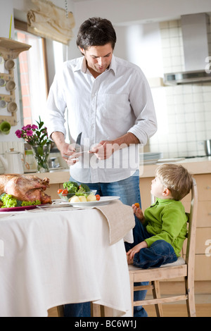 Family dining together Stock Photo