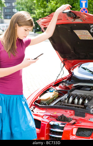 woman calling for car help Stock Photo