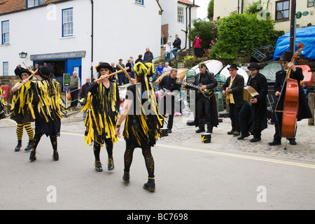"Flash Company", morris dancers in "Robin Hoods Bay", North Yorkshire, England, UK. Stock Photo