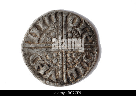 An old long cross hammered silver penny Stock Photo