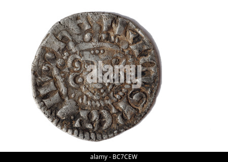 An old long cross hammered silver penny Stock Photo