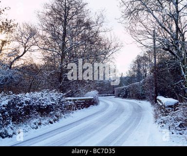A snow covered country lane in the village of Wrington, North Somerset, England Stock Photo