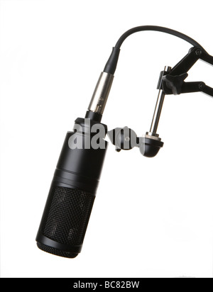 Studio microphone in holder / stand on a white background Stock Photo