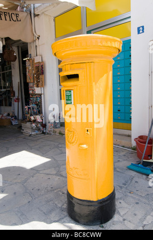 Yellow post box, Cyprus Stock Photo - Alamy