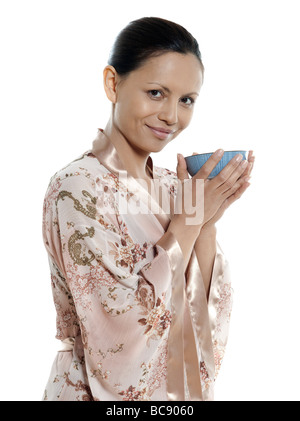 drinking hot drink tea woman asian on isolated white background