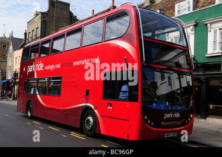 A red park and ride bus in Bridge Street Cambridge England UK Stock Photo