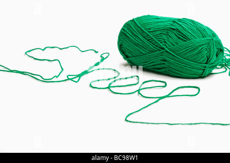 Green wool spelling the word sheep Stock Photo