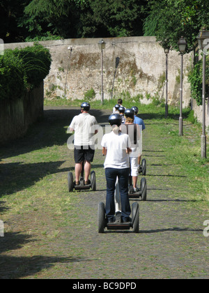 group of tourists on a segway guided tour in rome, italy Stock Photo