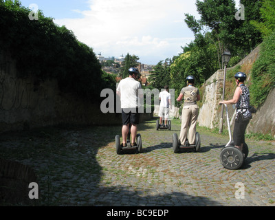 group of tourists on a segway guided tour in rome, italy Stock Photo