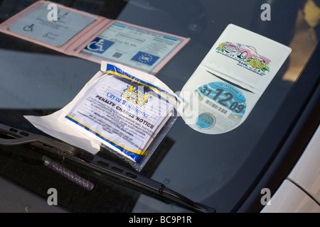 Penalty Charge Notice on a disabled car Westminster London Stock Photo