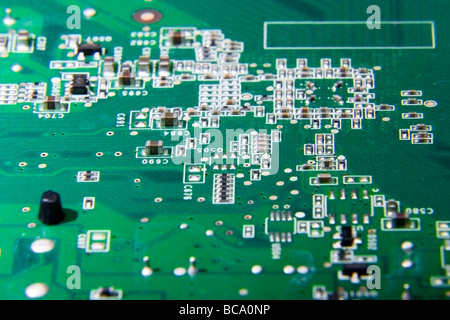 Circuit board of a video card showing the components including resistors, diodes, and capacitors. Stock Photo