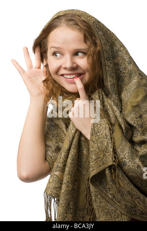 young listening woman in green shawl isolated on white Stock Photo