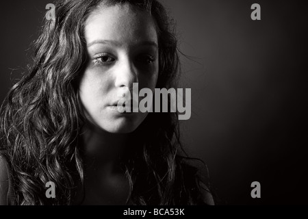 Powerful Black and White Shot of a Tearful Teenager Stock Photo