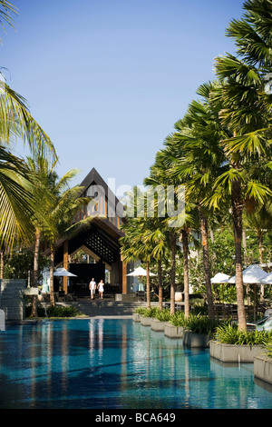 View over a swimming pool to an entrance of the luxury hotel Twinpalms Phuket Resort, Phuket's most exciting and stylish contemp Stock Photo