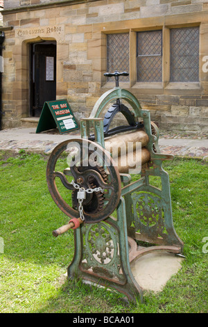 An old mangle outside 'Robin Hood's Bay' museum, Yorkshire. Stock Photo