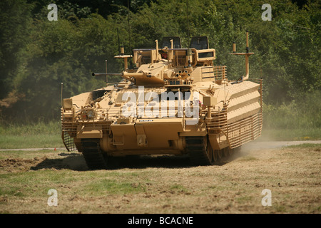 warrior armoured carrier and tank on display at British military event Stock Photo