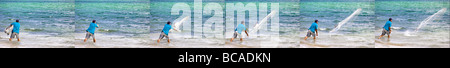 Sequence of a Cuban man fishes with cast net in Bahia de Cochinos, Bay of Pigs. Cuba. Stock Photo