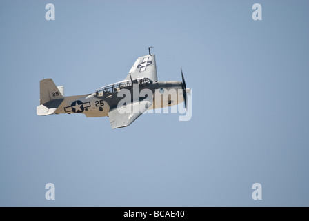 A Grumman Avenger flies at an air show Stock Photo